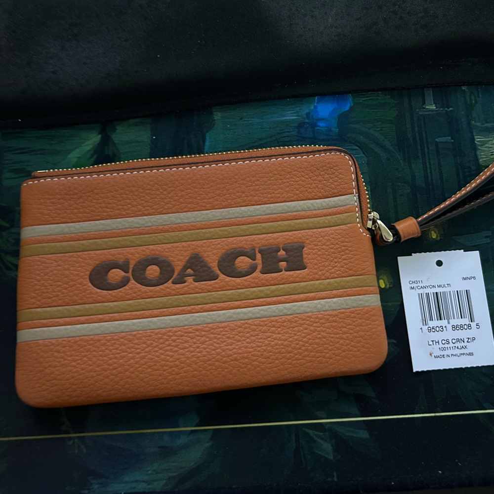 NEW---Coach Tan and Cream Leather Wristlet with Signature Logo